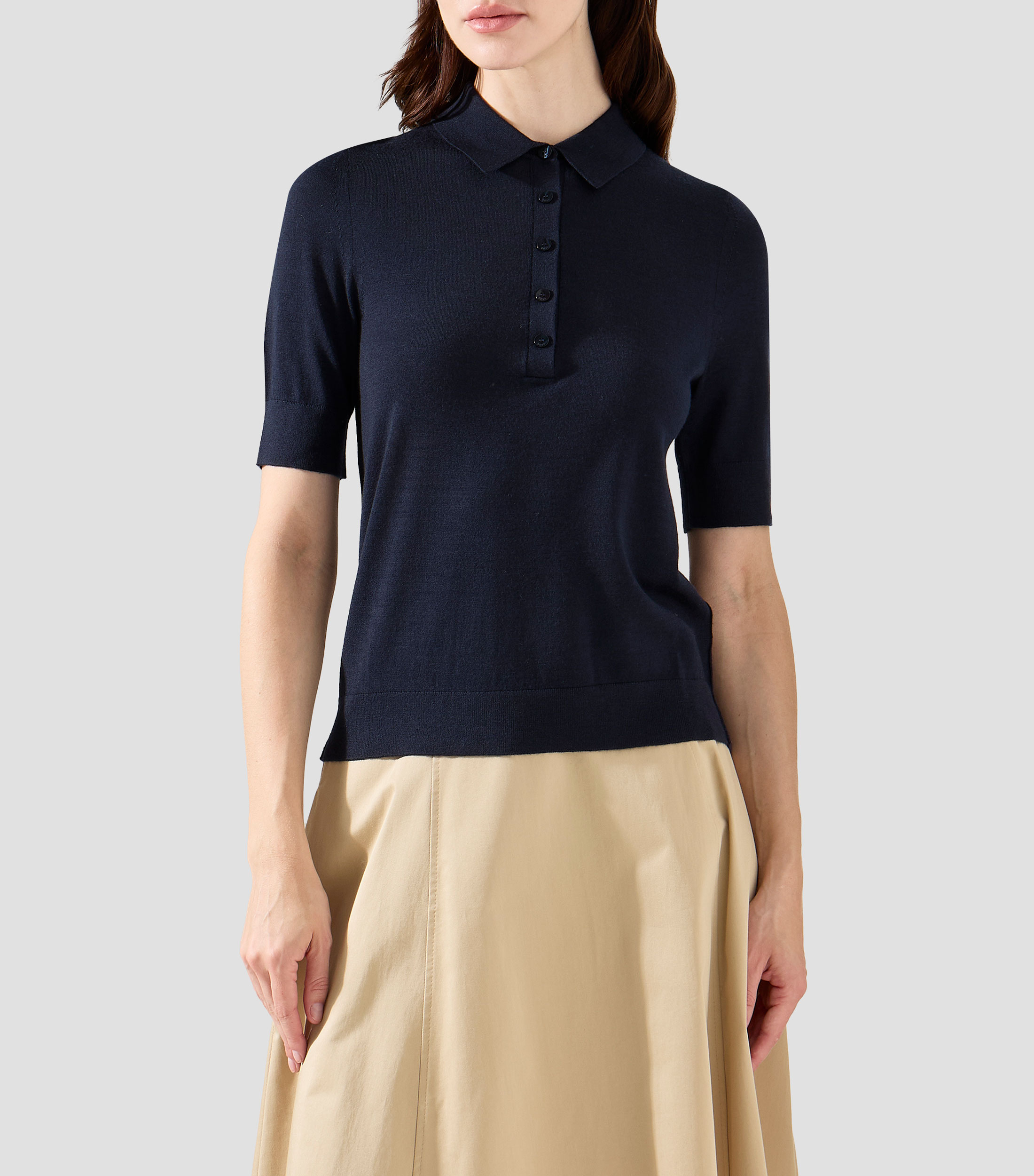 Playera estilo polo de manga corta en lana virgen con control de la humedad Mujer